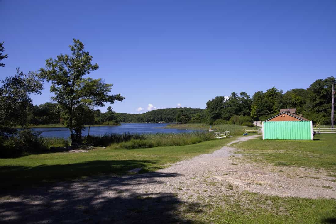 image of boathouse and lake